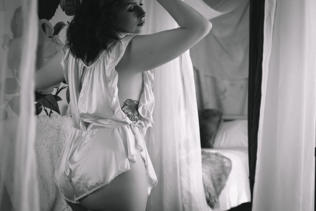 a bare elegance guest poses in a south carolina boudoir photoshoot