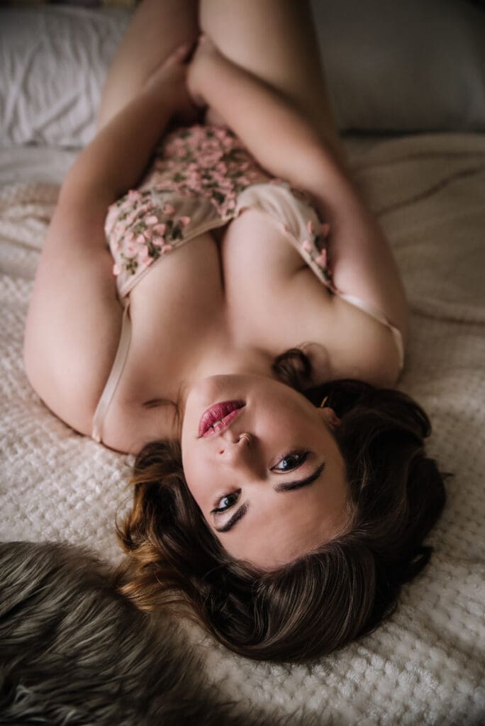 Boudoir session setup with soft focus and tasteful styling in a calm studio environment columbia south carolina
