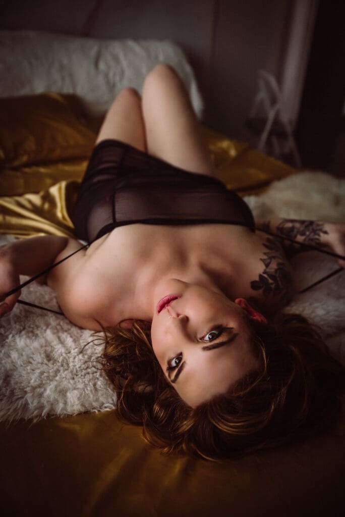 Boudoir photography capturing a relaxed pose and refined composition columbia sc