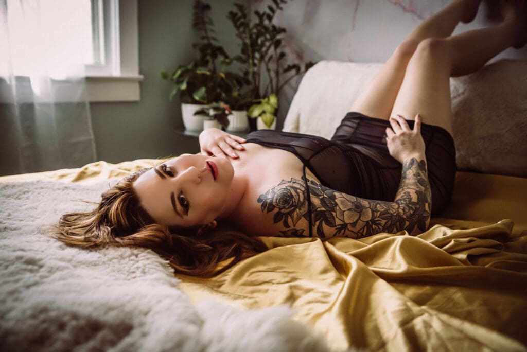 Boudoir portrait of a woman with soft lighting capturing her genuine confidence columbia south carolina