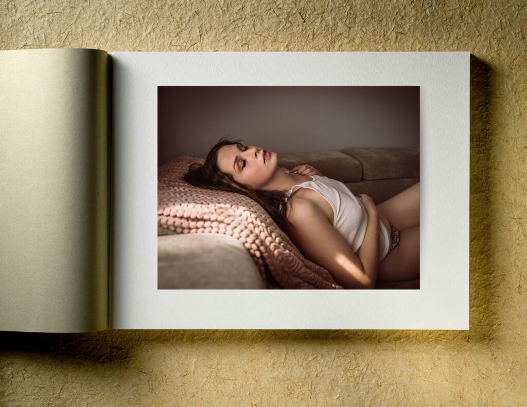 a first anniversary photo album featuring boudoir photography