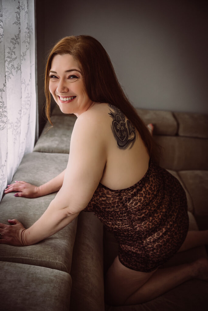boudoir photo of a smiling woman in Newberry SC